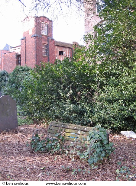 Rotting graveyard bench covered in ivy: St George's Church, Leicester, 06 March 2004