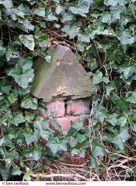 Buttress on churchyard wall covered in ivy: St George's Church, Leicester, 06 March 2004