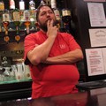 Barman Kim thinking, Millstone Lane, Leicester, 08 March 2004
