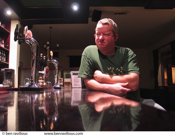 Grant Cook sitting at bar: Millstone Lane, Leicester, 08 March 2004