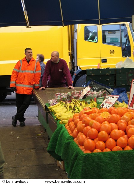 Fruit stall and market cleaners: Leicester Market, Market Place, Leicester, 27 March 2004