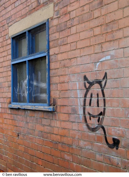 Blue window and graffiti devil: Frog Island, Leicester, 01 May 2004
