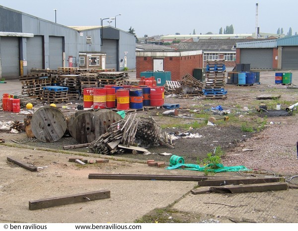 Rubbish-strewn factory yard: Wallingford Road, Leicester, 01 May 2004