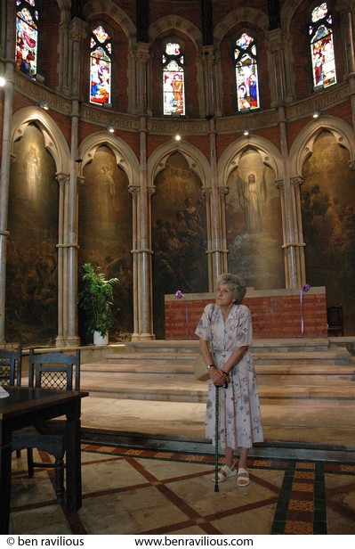 Woman standing in St Mark's Church: Belgrave Road, Leicester, 09 July 2005