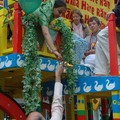 Oil lamp being passed up to devotees on Ratha Yatra chariot, Humberstone Gate, Leicester, 31 July 2005