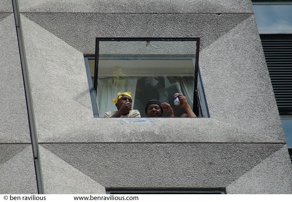 Watching the carnival parade from a flat: St Georges Way, Leicester, 06 August 2005