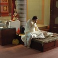 Pundit on the telephone, Chander Road, Singapore, 15 December 2005