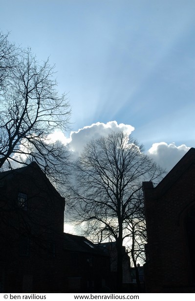 Sun rays, cloud and factory buildings: All Saints Churchyard, Highcross Street, Leicester, 18 February 2006