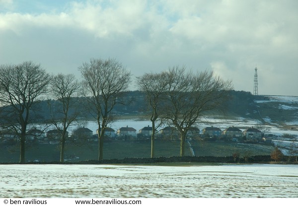 Row of houses on a hill: Peak District, near Buxton, Derbyshire, 06 March 2006