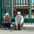 Two Muslim men having a smoke and a chat, Conduit Street, Leicester, 16 April 2006