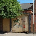 Back gate with graffiti and elder tree, Mere Road, Leicester, 03 June 2006