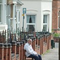 Man sitting outside his house, St Saviours Road, Spinney Hills, Leicester, 04 June 2006