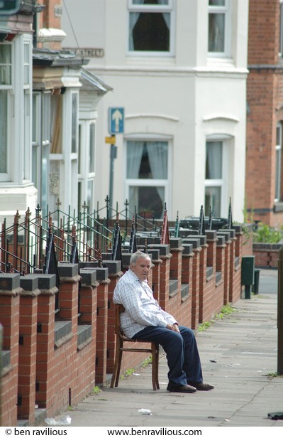 Man sitting outside his house: St Saviours Road, Spinney Hills, Leicester, 04 June 2006