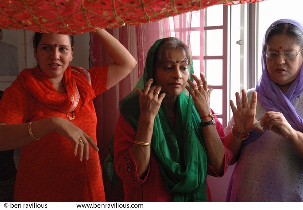 Women  at a hindu oil ceremony: Bukit Batok, Singapore, 30 June 2006