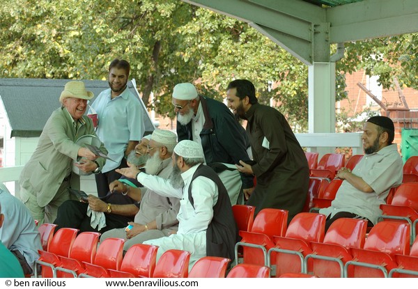 Handing out match scorecards: Imams vs Christian Clerics cricket match, Leicestershire Country Cricket Ground, Grace Road, Leicester, 11 September 2006