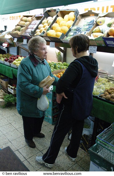 Greengrocer talking to customer: East Park Road, Spinney Hills, Leicester, 04 November 2006