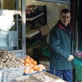 Man leaving greengrocer's shop, East Park Road, Spinney Hills, Leicester, 04 November 2006