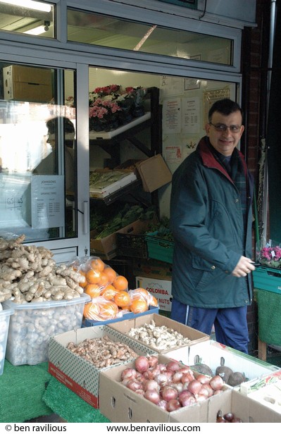 Man leaving greengrocer's shop: East Park Road, Spinney Hills, Leicester, 04 November 2006
