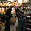 Greengrocer helping a customer, East Park Road, Spinney Hills, Leicester, 04 November 2006
