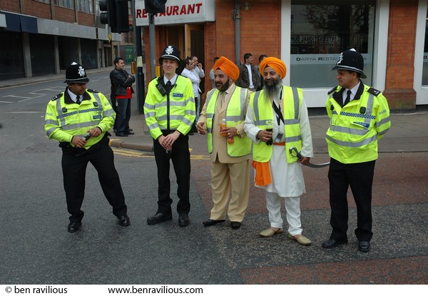 Policemen and parade organisers pose for a photograph: Vaisakhi Parade 2007, Humberstone Gate, Leicester, 22 April 2007