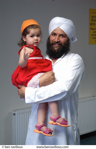 Sikh man and girl: Vaisakhi Parade 2007, Guru Tegh Bahadur Gurdwara, East Park Road, Leicester, 22 April 2007